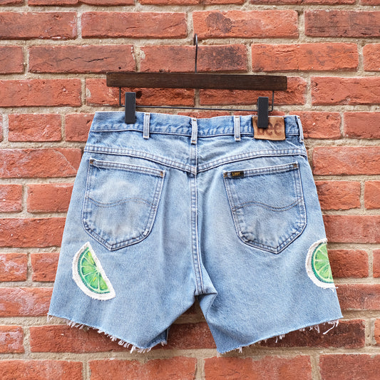 fruit patch denim cutoffs - lime 34